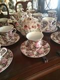                       Chintz patterned dishes;