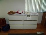 Double dresser with linens on top