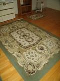 Area rug with two small side rugs