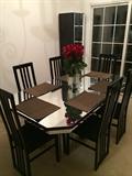 Sharut Dining Room Table. Includes leaf and 6 chairs.