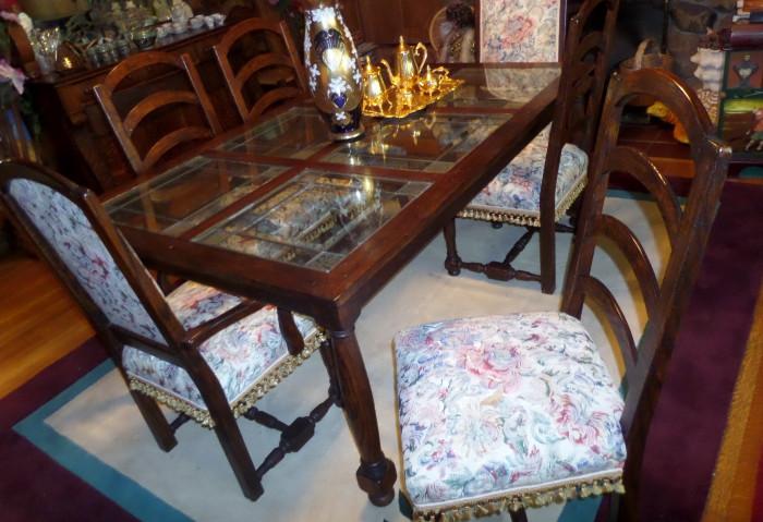 1970's glass and wood dinning table and chairs in great shape
