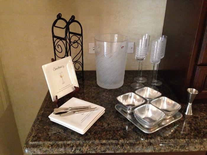 Salviati crystal champagne flutes and Salviati Piume ice bucket.  Pottery Barn serving items, lovely decorative appetizer plates.
