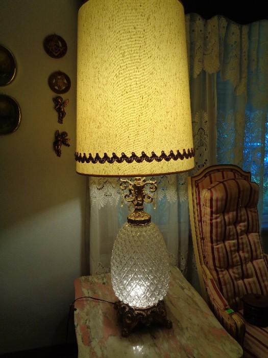 Pair of glass pineapple hospitality lamps. 44 inches tall.  Base lights separately from top of lamp.