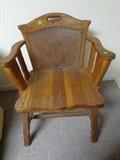 Western style Tooled leather with western steer head. No cracks or breaks in wood this piece measures 25 inches wide the back stands 35 inches and the seat measures 17 inches out.