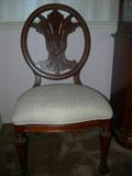 Carved Leaf Back and Upholstered Seat
