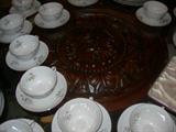 Decorative Carving Visible from Table Top Surface