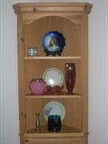 Mal Maissione Collectible Plate, Bavarian Floral Plates, Carnival Glass and Pewter in a narrow corner shelf