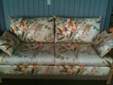 Castro Convertible Queen Sleeper Sofa with Floral Upholstery & Pillows with Rattan Legs