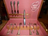 Sterling Flatware Set by Oneida/Heirloom, "Lasting Spring" circa 1949:
Knives (4); Butter (4); Spoons (6); Dinner Forks (4); Salad Forks (6)