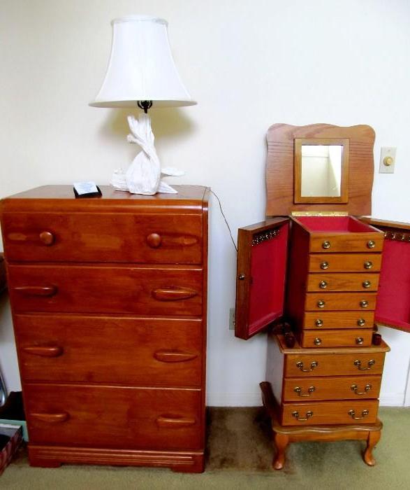 Vintage Colonial Style Chest of Drawers with rich Honey Oak finish and curved wooden pulls; Also shown is a Queen Anne Style Jewelery Chest with oak finish, lots of jewelry drawers storage, lift up top storage and mirror, and  hinged  side pull outs for hanging necklaces; Accent Table Lamp shown is also available.