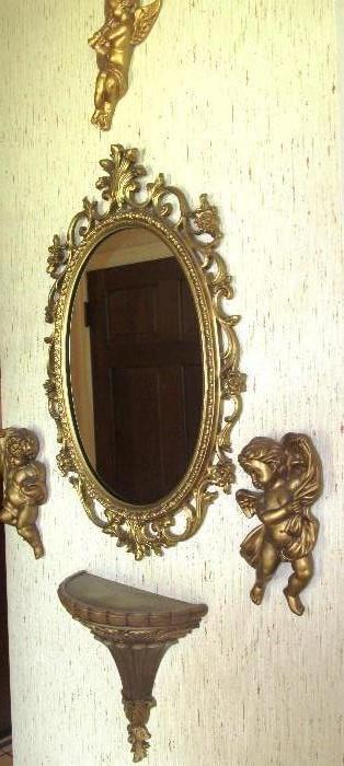 Foyer Set...ornately framed mirror, small gilt shelf, gilt cherubs