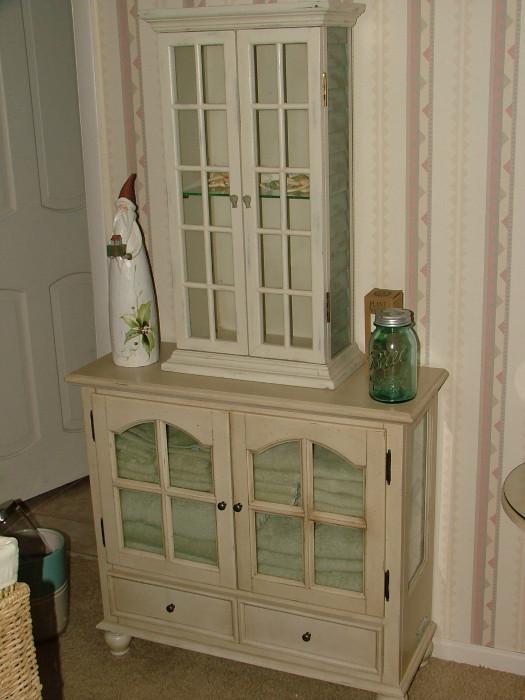 I love these shabby chic cabinets - this one was used for towels in a bathroom, but this is highly functional!