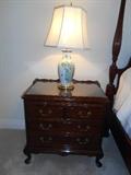 Upstairs-Master Bedroom:  One of two CENTURY night stands with four drawers and upper pull out shelf measures 27-3/4" wide x 18" deep x 27" tall with Queen-Anne style legs (each has a custom glass top); one of pair of porcelain lamps.