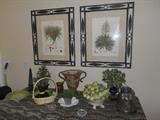 Kitchen:  Two framed prints (metal frames) and a collection of various décor.