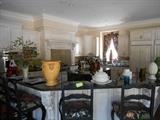 Kitchen:  Florals, urns, MOTTAHEDEH cream color bird motif ltureen, and more!  The bar stools are staying with the house  and are not for sale.