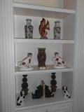 Kitchen/Hearth Room:  A bookcase with decorative  items.