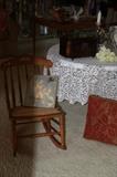 ROCKING CHAIR WOVEN WICKER $25 Lace table Cloth $20 crystal decanter $30 (These are the 1/2 prices)