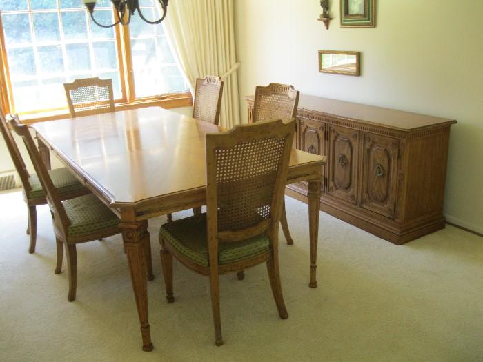 Pecan dining room set with extra leaves and chairs   $250