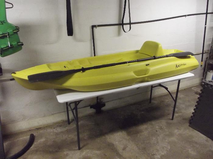 Kayak by Moorea, with double sided paddle, good condition .