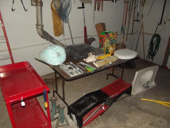 Tool cart, jack stands, car ramps, lots of miscellaneous items 