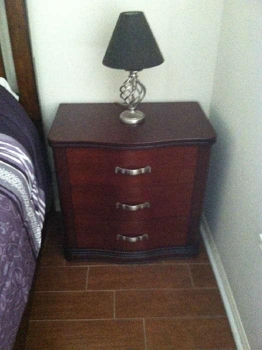 Pair of matching dark wood end tables. Part of King size bedroom set.