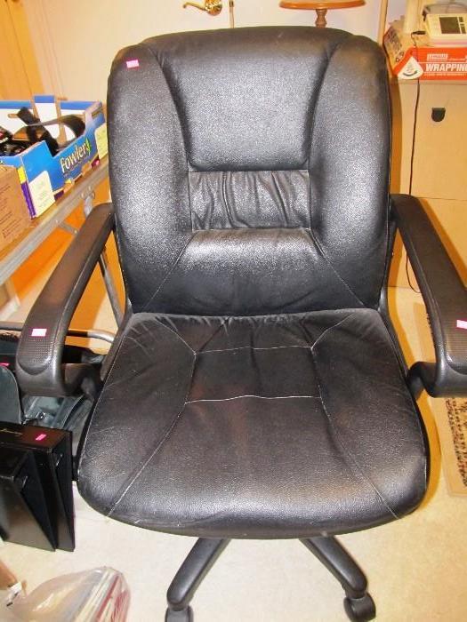 Office Arm Chair on Caster Mounts  with black leather-like upholstery
