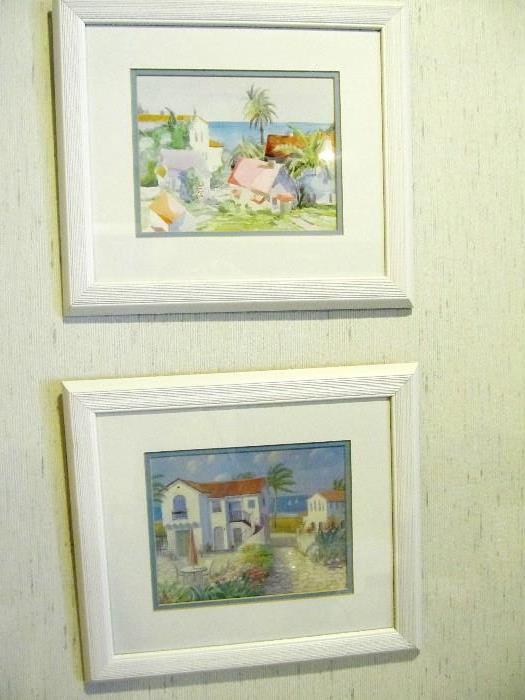 Artworks depicting Caribbean street scenes.  One is signed by artist. 