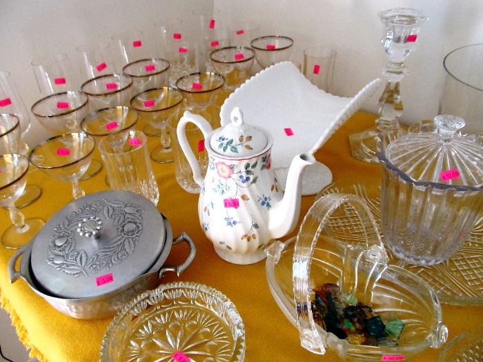 Some of the Collection of Glasswares...pressed glass,  stemwares, vases,  glass basket, teapot and good aluminum covered dish available in this sale.