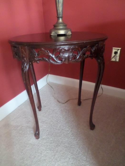 Carved wooden end table