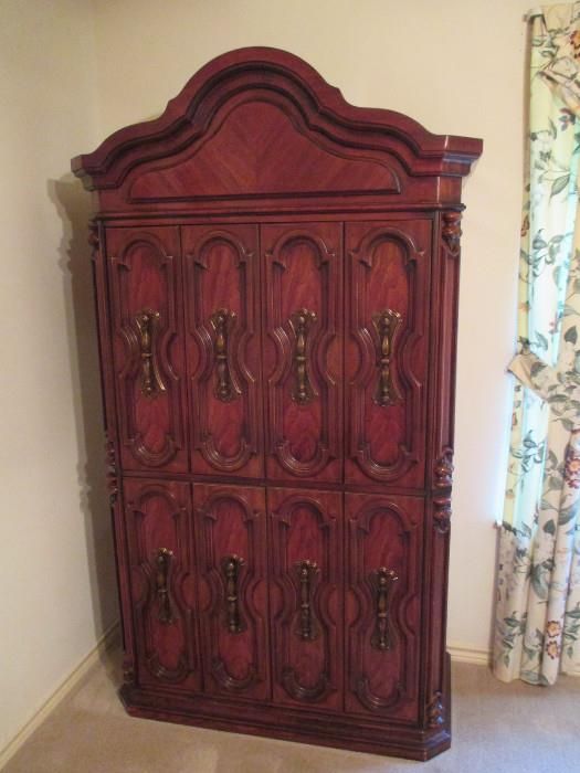 Nice Vintage Bachelor Cabinet Wardrobe of high quality solid wood of 1970's.  This in the Mediterranean Style that was so popular in the groovy 70's.  One part of a matching bedroom set (priced separately)
