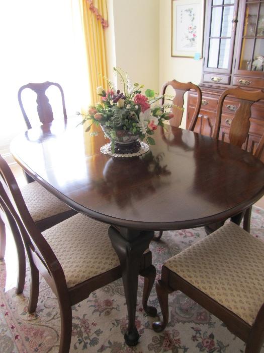 Queen Anne Mahogany Dining Room Table, with 2 Leaves, 6 Chairs and Break Front, Under the Table is a Persian silk 6X9 Oriental Handmade Carpet 