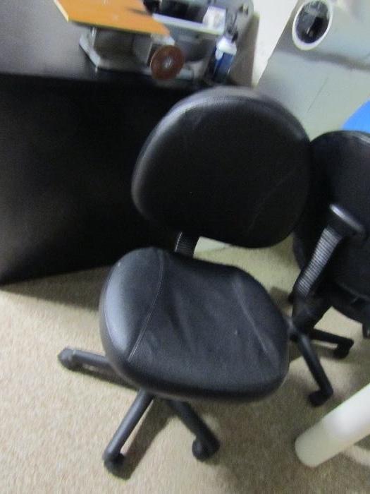One of two office chairs - swivel/adjustable 