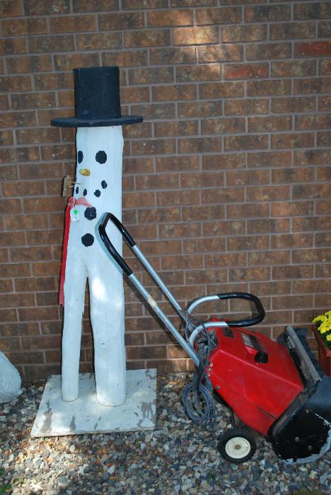 Yard art and snowblower