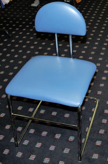 Four of these cool blue mid century chairs