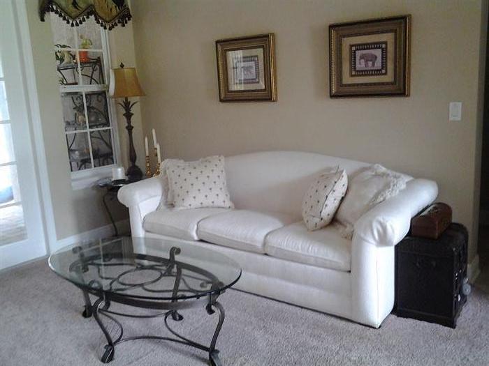 Beautiful sofa with wonderful décor and accent pieces.  Matching chair is also available