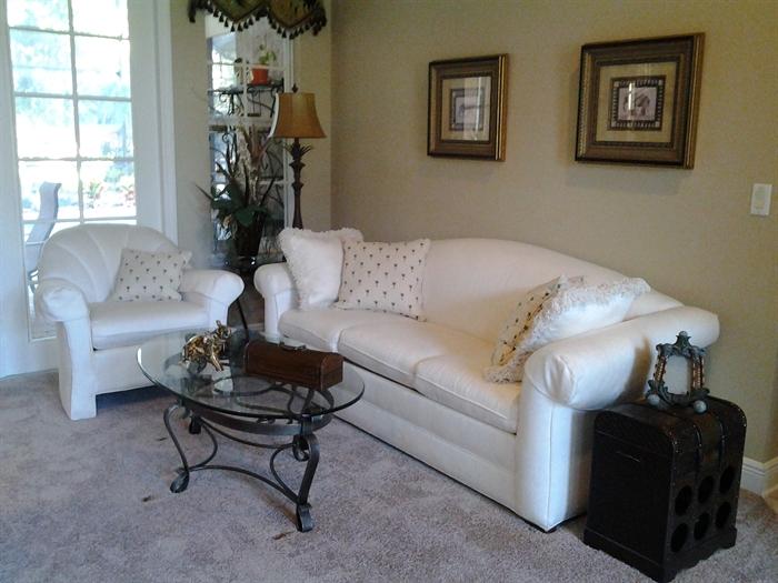 Beautiful Sleeper sofa and matching chair, Glass and metal coffee table and matching lamp table.  Wonderful décor pieces