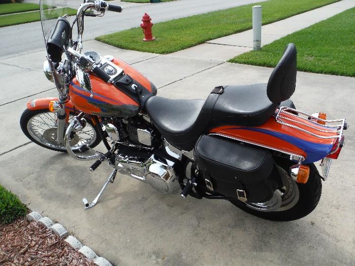 95th Anniversary "Swamp Hog" edition softail custom with a Screaming Eagle stage one kit.  Professional orange and blue paint job with gator heads on the tanks. Corbin custom seat with gator leather design.  (Original softail seat is included)  Harley-Davidson synthetic oil used in all compartments.  Parts and service manual is included.  
