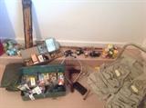 Lots of fishing supplies and a couple rods and reels