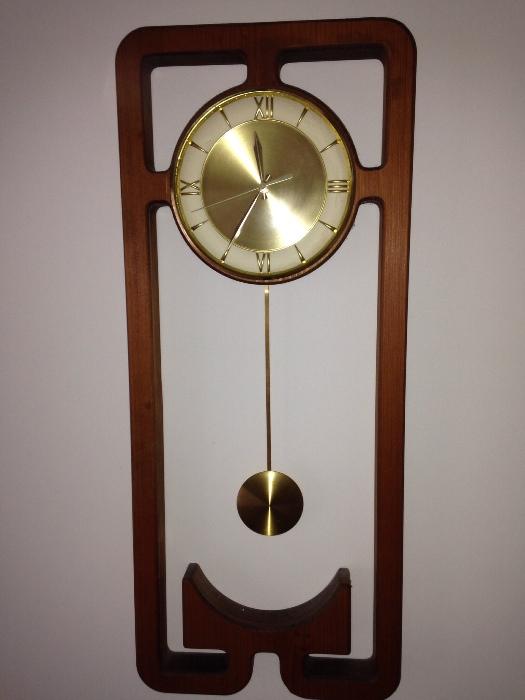 Very cool teak wall clock I could not find a maker 