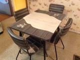 The dinette set from the early 60's is in really good condition, and the inlaid gray formica is in great shape!