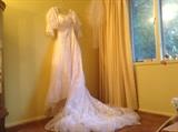 Vintage Lion Store 1980's wedding dress with veil and enormous train, beautiful beadwork, and lots of lace