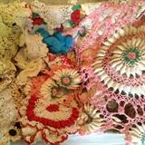 hand crocheted doilies and table tops
