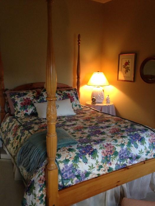 Four poster pine queen sized bed for sale.