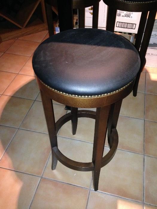 closer view of one of the three stools