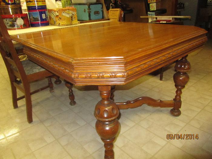 Antique Table with pads.