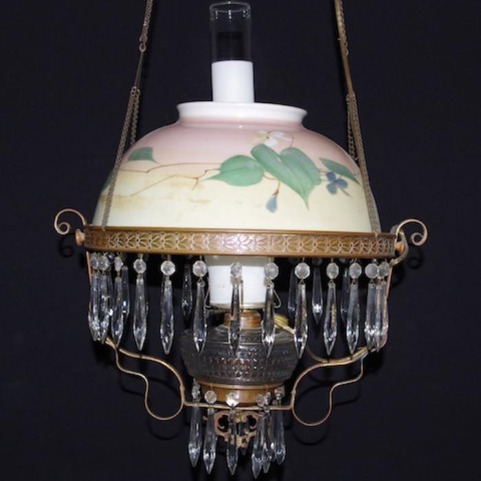 Antique Electrified Oil Lamp Chandelier with Hand Painted Globe and Crystal Prisms. Hardwired
Condition: Very good
Shipping: No
Size: 15x15x20"
Location: DR