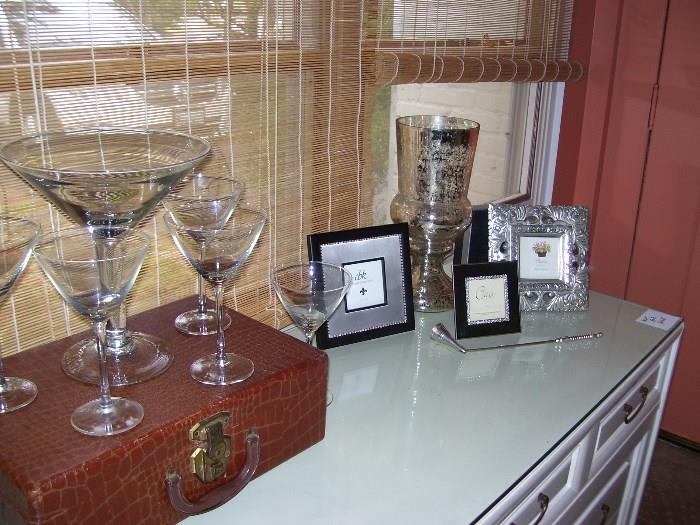 Martini glasses, frames and vase