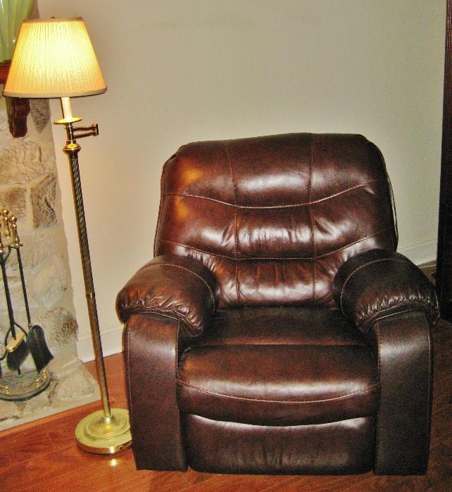 Leather swivel rocker/recliner--matches sofa