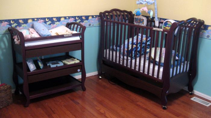 Changing table and scalloped edged baby bed