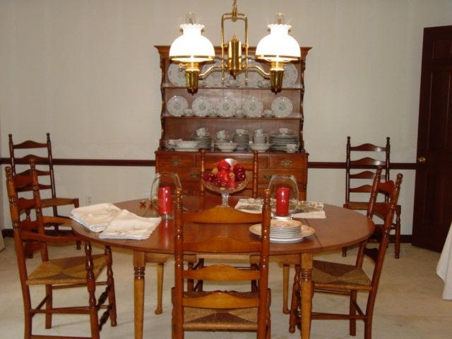 Vermont Solid Rock Maple Round Table with Four Leaves, pads, six Ladder back chairs & Open Hutch.